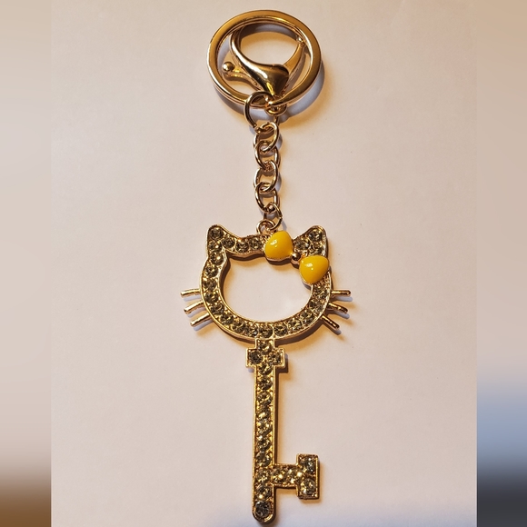 Hello Kitty Fashion Key Bag Charm / Keychain Yellow / Gold - Picture 1 of 4